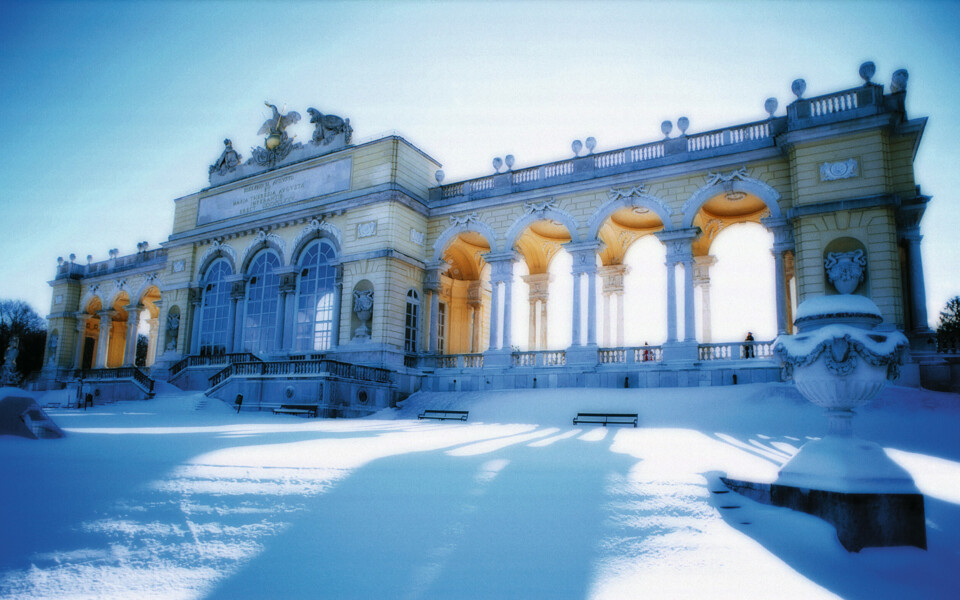 Enjoy winter in Vienna with 13% off: the Gloriette at Schönbrunn Palace glistening in the snow.