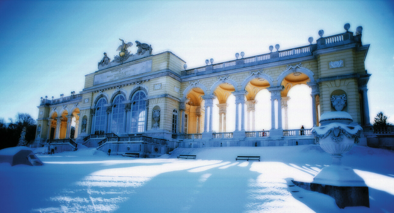 Enjoy winter in Vienna with 13% off: the Gloriette at Schönbrunn Palace glistening in the snow.