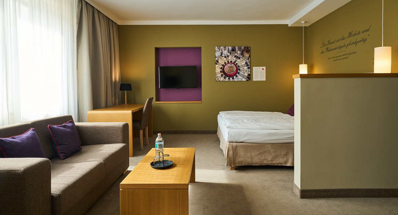 Large family suite with balcony at the Hotel Henriette in Vienna.