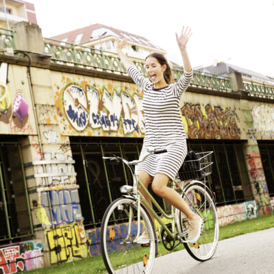 Happy cyclist on the Donaukanal which separates Vienna's 1st and 2nd districts