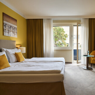 Großzügiges & individuell gestaltetes Hotelzimmer im Zentrum von Wien im Henriette Stadthotel.