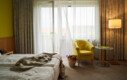 Single room with tree-lined views at the boutique hotel Henriette in Vienna.