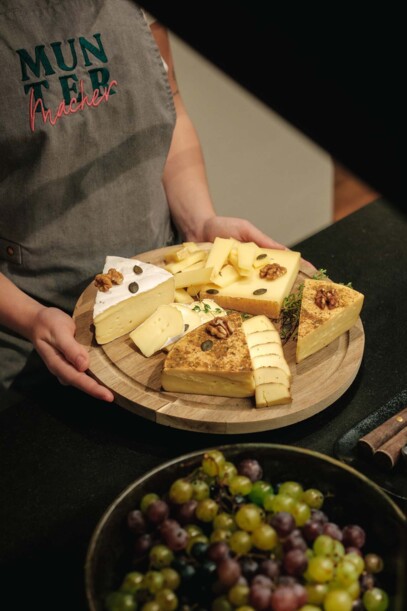 Cheese platter and grapes at the organic breakfast at Henriette City Hotel Vienna.
