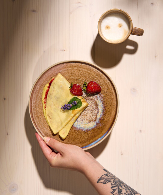 Homemade pancakes with fresh fruit at the Henriette Stadthotel in Vienna.