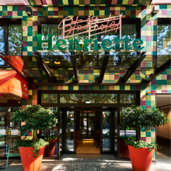 The entrance and the new colorful façade of the 4-star Henriette Hotel in Vienna.